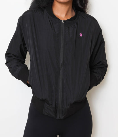 Black bomber jacket with a logo on a white background
