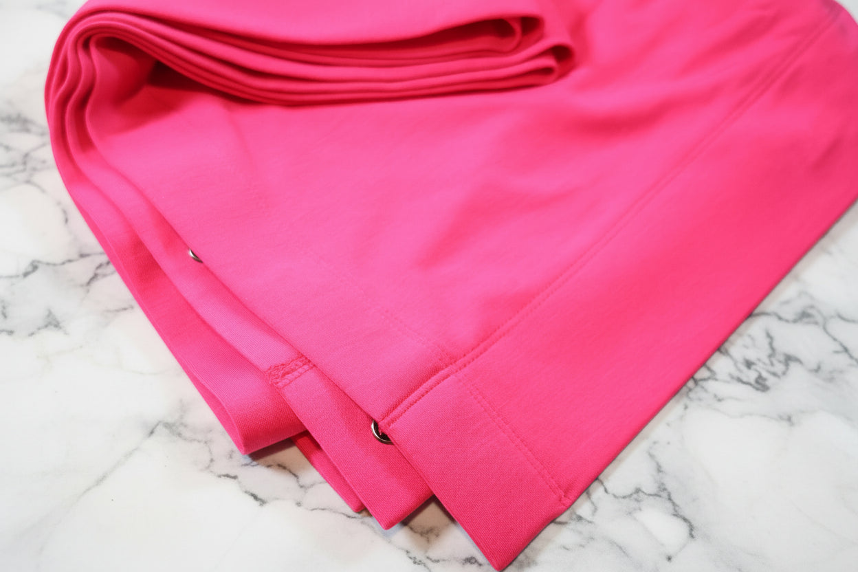 Pink fabric on a white background