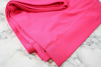 Pink fabric on a white background