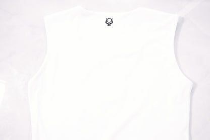 Soft cream sleeveless top with Past Life Attire brand logo on a marble white background